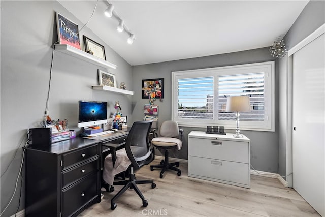 3340 E Collins Ave Unit 30, Orange, CA 92867 - office featuring lofted ceiling, light wood finished floors, baseboards, and rail lighting