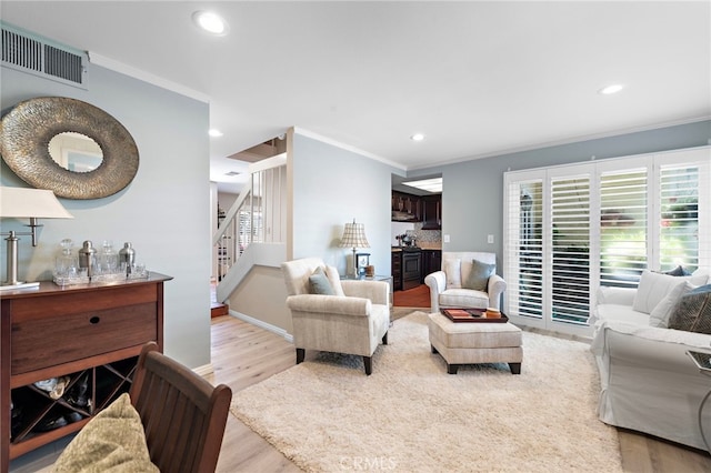 3340 E Collins Ave Unit 30, Orange, CA 92867 - living room featuring crown molding, wood finished floors, stairway, recessed lighting, and baseboards