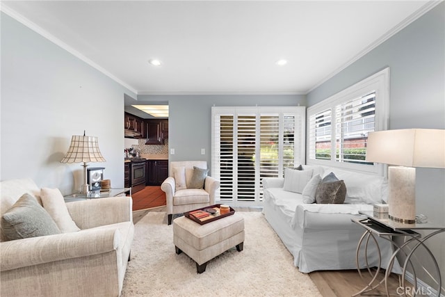 3340 E Collins Ave Unit 30, Orange, CA 92867 - living room featuring crown molding, light wood-style floors, and recessed lighting