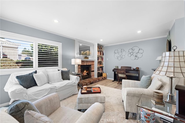3340 E Collins Ave Unit 30, Orange, CA 92867 - living area with ornamental molding, wood finished floors, recessed lighting, a brick fireplace, and baseboards
