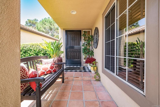 26395 Marsala Way, Mission Viejo, CA 92692 - view of exterior entry with stucco siding and a porch