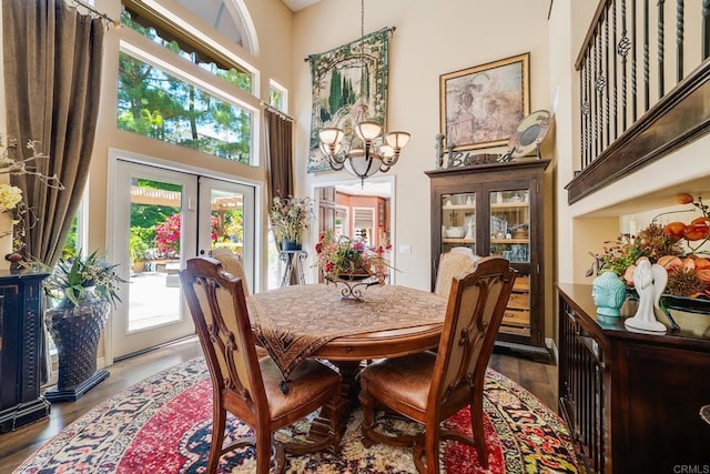 26395 Marsala Way, Mission Viejo, CA 92692 - dining room with a high ceiling, a chandelier, wood finished floors, and french doors