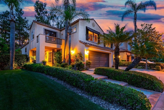 26395 Marsala Way, Mission Viejo, CA 92692 - mediterranean / spanish-style home featuring a balcony, a garage, stucco siding, and a tiled roof