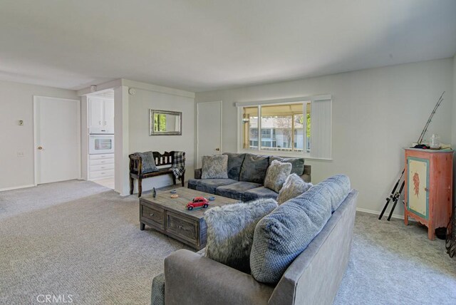 378 Avenida Castilla Unit O, Laguna Woods, CA 92637 - living area with light carpet and baseboards