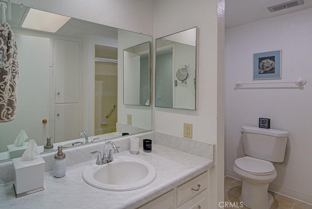 378 Avenida Castilla Unit O, Laguna Woods, CA 92637 - bathroom with toilet, vanity, a shower, and baseboards