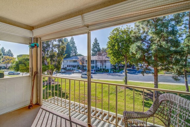 378 Avenida Castilla Unit O, Laguna Woods, CA 92637 - sunroom with a residential view