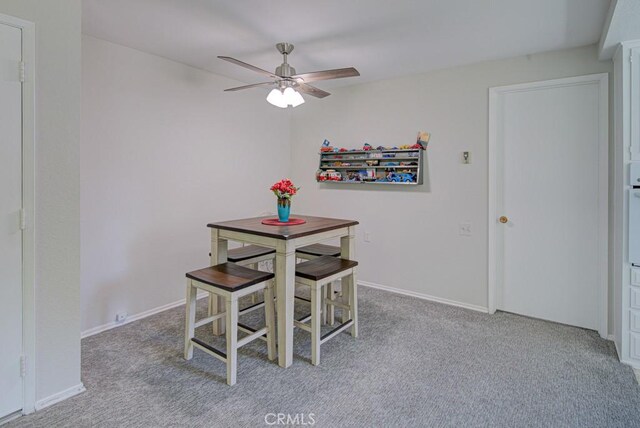 378 Avenida Castilla Unit O, Laguna Woods, CA 92637 - dining space with carpet flooring, ceiling fan, and baseboards