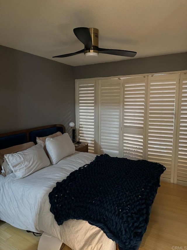 1355 N Sierra Bonita Ave Unit 204, West Hollywood, CA 90046 - bedroom with wood finished floors and ceiling fan