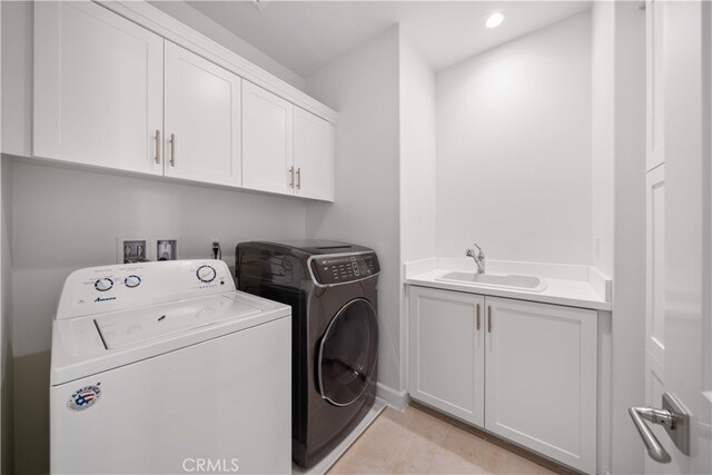112 Turning Post, Irvine, CA 92620 - laundry room with cabinet space, washer and dryer, baseboards, light tile patterned floors, and recessed lighting