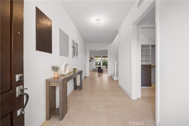 112 Turning Post, Irvine, CA 92620 - hallway with light tile patterned floors and baseboards