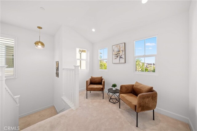 112 Turning Post, Irvine, CA 92620 - living area with an upstairs landing, carpet, baseboards, and lofted ceiling