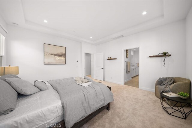 112 Turning Post, Irvine, CA 92620 - bedroom featuring a raised ceiling, recessed lighting, light carpet, baseboards, and connected bathroom