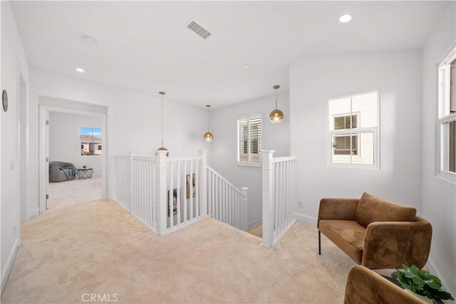 112 Turning Post, Irvine, CA 92620 - hallway with an upstairs landing, light carpet, healthy amount of natural light, recessed lighting, and baseboards