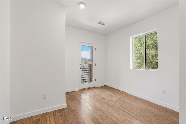 1944 Seminole Dr, Agoura Hills, CA 91301 - unfurnished room with healthy amount of natural light, light wood finished floors, and baseboards