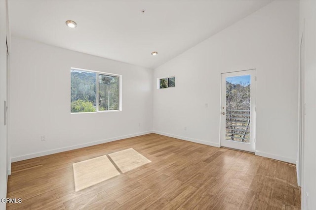 1944 Seminole Dr, Agoura Hills, CA 91301 - empty room with lofted ceiling, light wood-style floors, and baseboards