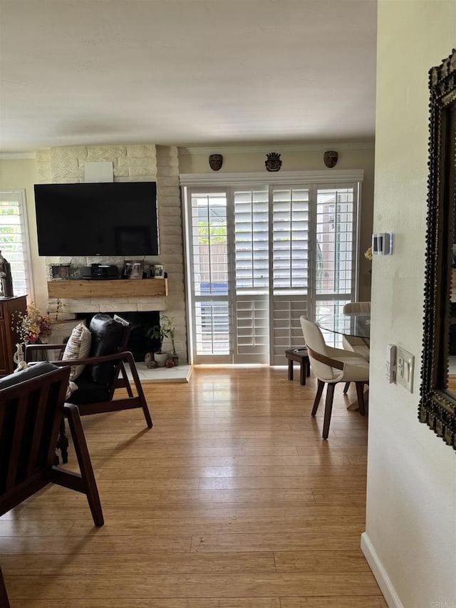 7975 Playmor Ter, San Diego, CA 92122 - living area featuring wood finished floors and baseboards