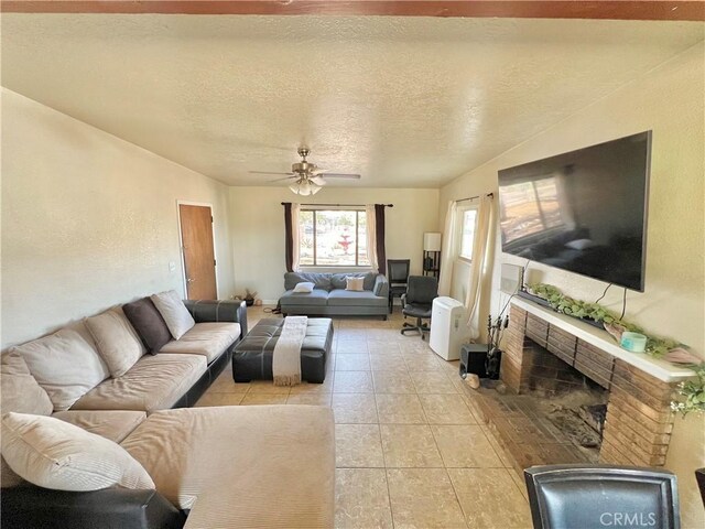 23079 Minnetonka Rd, Apple Valley, CA 92308 - living area featuring a textured ceiling, ceiling fan, light tile patterned floors, and lofted ceiling