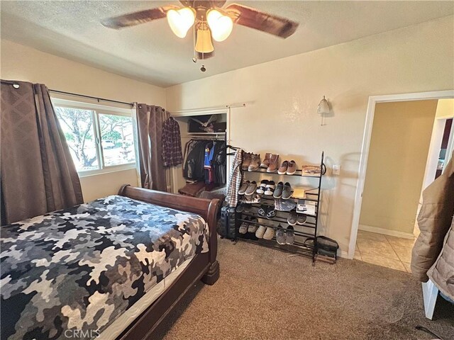 23079 Minnetonka Rd, Apple Valley, CA 92308 - bedroom featuring carpet floors, ceiling fan, and a textured ceiling