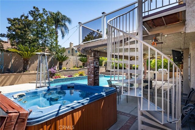 28852 Glenheather Dr, Highland, CA 92346 - fenced backyard featuring stairway and a hot tub