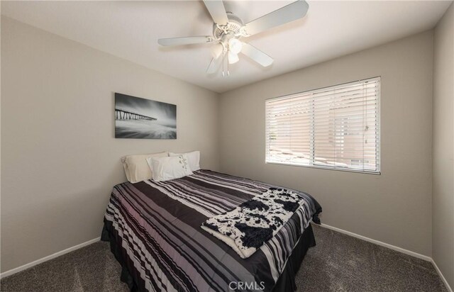 28852 Glenheather Dr, Highland, CA 92346 - bedroom with carpet flooring, baseboards, and a ceiling fan