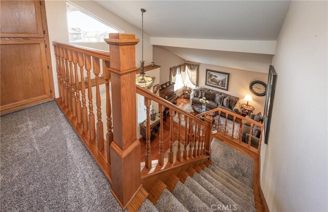 28852 Glenheather Dr, Highland, CA 92346 - staircase with lofted ceiling, plenty of natural light, and carpet flooring