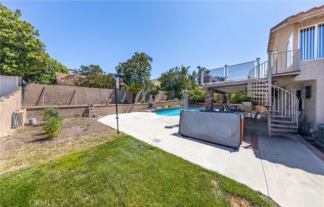 28852 Glenheather Dr, Highland, CA 92346 - view of pool featuring stairway and a patio