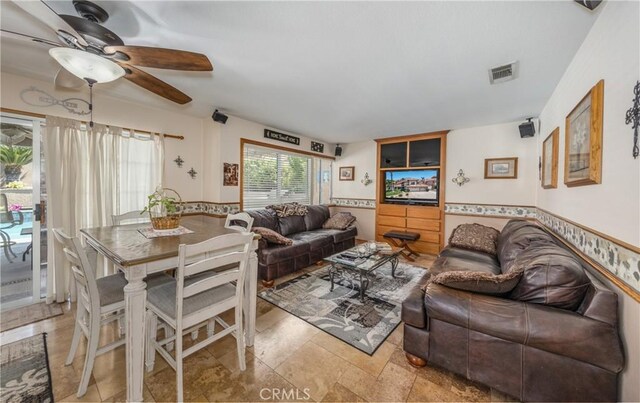 28852 Glenheather Dr, Highland, CA 92346 - living area featuring ceiling fan and wainscoting