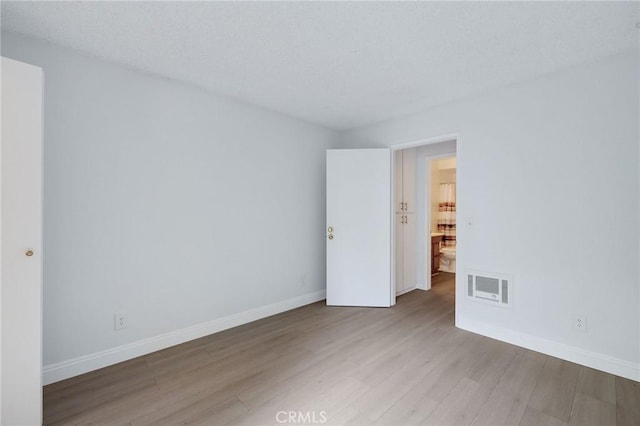 3602 W Estates Ln Unit 306, Rolling Hills Estates, CA 90274 - unfurnished room featuring wood finished floors and baseboards