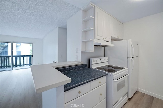 3602 W Estates Ln Unit 306, Rolling Hills Estates, CA 90274 - kitchen with white electric stove, open shelves, under cabinet range hood, light wood finished floors, and white cabinetry