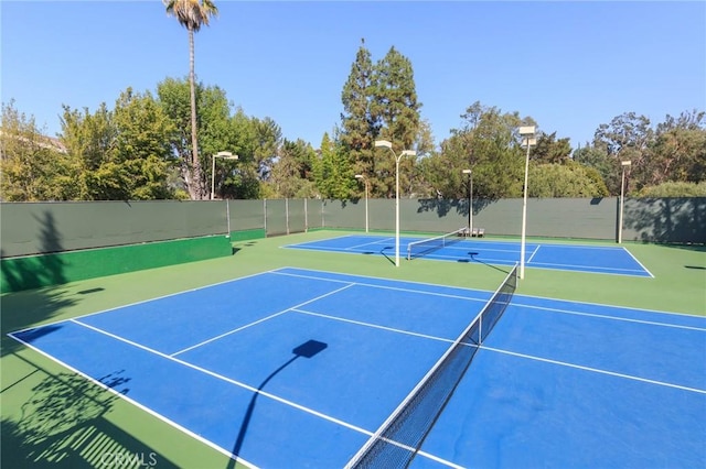 3602 W Estates Ln Unit 306, Rolling Hills Estates, CA 90274 - view of tennis court featuring community basketball court and fence