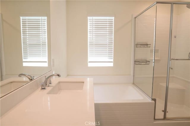 13936 Blossom Way, Eastvale, CA 92880 - bathroom with a shower stall, a garden tub, and vanity