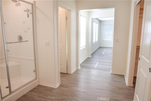 13936 Blossom Way, Eastvale, CA 92880 - hall with baseboards and wood finished floors
