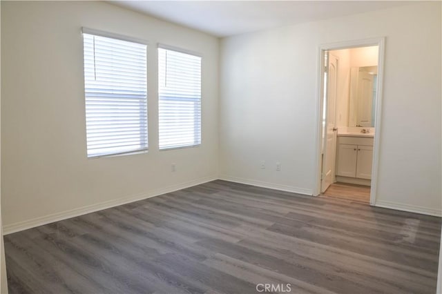 13936 Blossom Way, Eastvale, CA 92880 - empty room featuring wood finished floors and baseboards