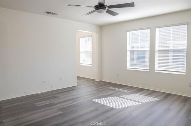 13936 Blossom Way, Eastvale, CA 92880 - unfurnished room with wood finished floors, ceiling fan, and baseboards