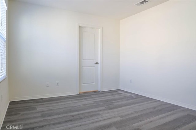 13936 Blossom Way, Eastvale, CA 92880 - unfurnished room featuring wood finished floors and baseboards
