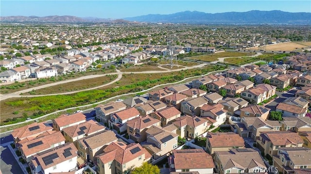 13936 Blossom Way, Eastvale, CA 92880 - aerial overview of property's location featuring a mountainous background and nearby suburban area