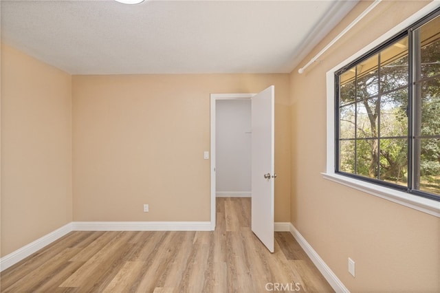 42490 Ranger Circle Way, Coarsegold, CA 93614 - unfurnished room featuring light wood finished floors and baseboards