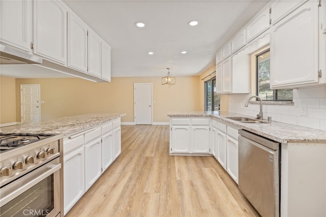42490 Ranger Circle Way, Coarsegold, CA 93614 - kitchen featuring a sink, stainless steel appliances, light wood-style floors, recessed lighting, and white cabinets