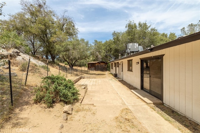 42490 Ranger Circle Way, Coarsegold, CA 93614 - view of yard featuring a patio area and central AC unit