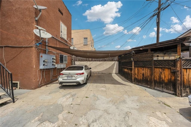 2006 S Harcourt Ave, Los Angeles, CA 90016 - view of home's exterior with a carport