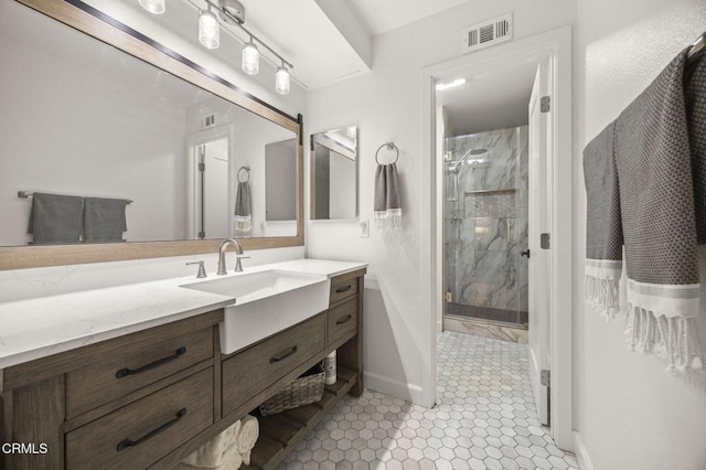 2328 N H St, Oxnard, CA 93036 - full bathroom featuring a stall shower, vanity, and baseboards