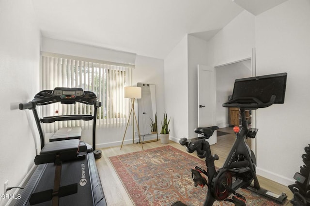 2328 N H St, Oxnard, CA 93036 - workout area featuring wood finished floors, baseboards, and lofted ceiling