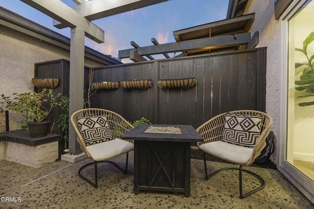 2328 N H St, Oxnard, CA 93036 - patio terrace at dusk with a fire pit and a pergola