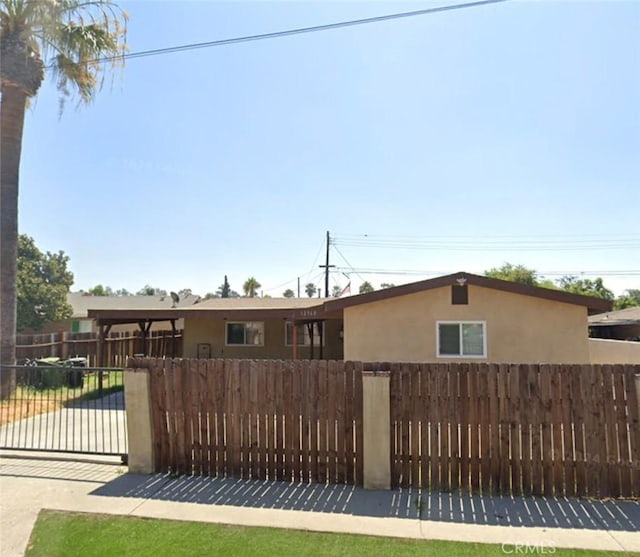 12968 Vaughn St, San Fernando, CA 91340 - view of front of house featuring stucco siding