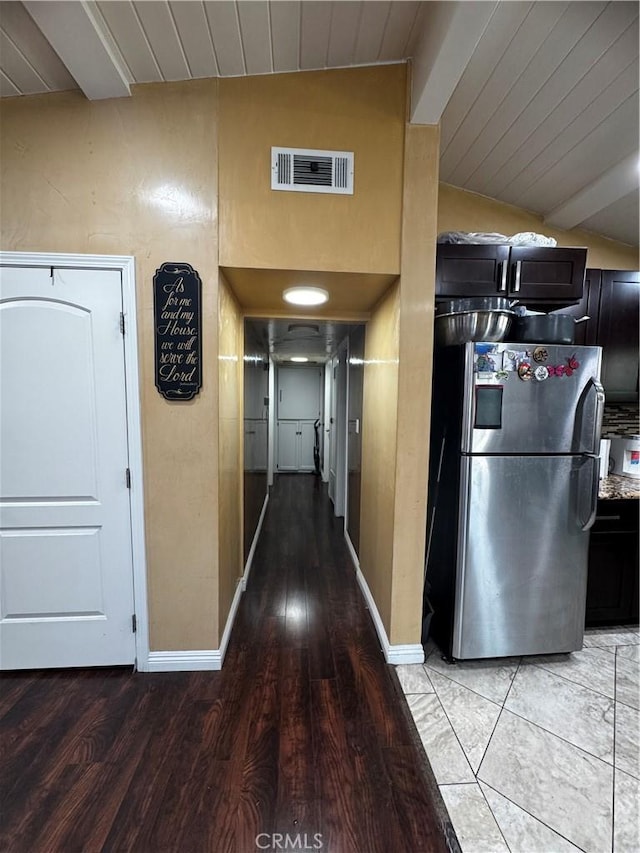 12968 Vaughn St, San Fernando, CA 91340 - corridor featuring vaulted ceiling, baseboards, and light wood finished floors