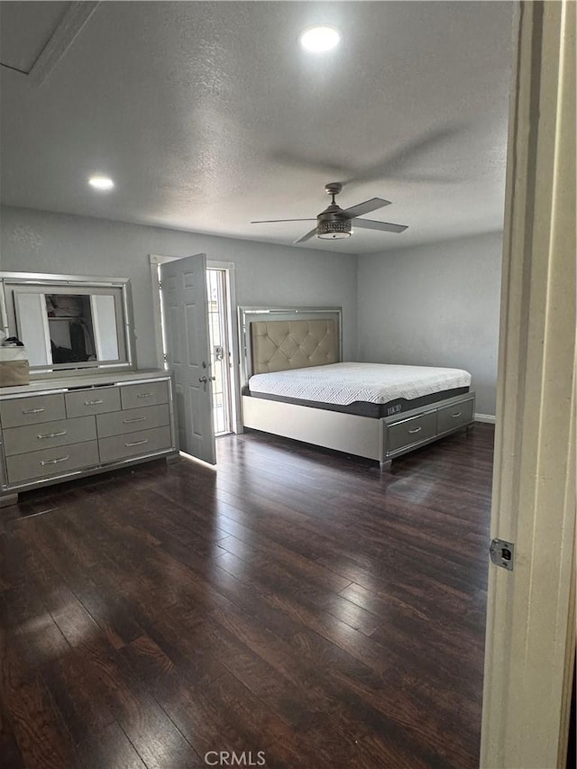 12968 Vaughn St, San Fernando, CA 91340 - bedroom featuring dark wood finished floors, recessed lighting, a textured ceiling, a ceiling fan, and baseboards