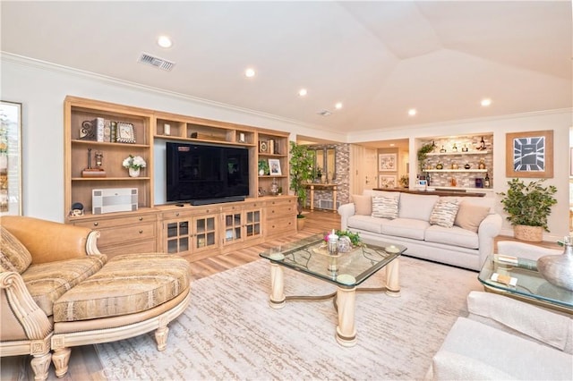 890 El Mirador, Upland, CA 91784 - living area featuring vaulted ceiling, ornamental molding, wood finished floors, built in shelves, and recessed lighting