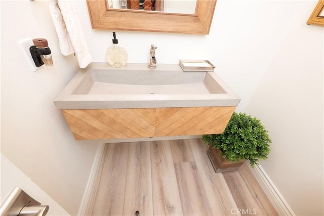 890 El Mirador, Upland, CA 91784 - bathroom with wood finished floors and vanity
