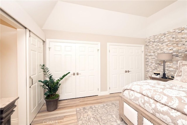 890 El Mirador, Upland, CA 91784 - bedroom featuring two closets and light wood-style flooring