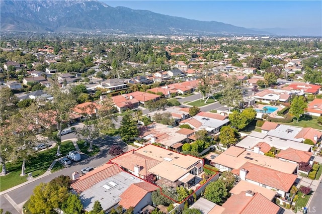 890 El Mirador, Upland, CA 91784 - aerial view of residential area with a mountain backdrop and property boundaries highlighted